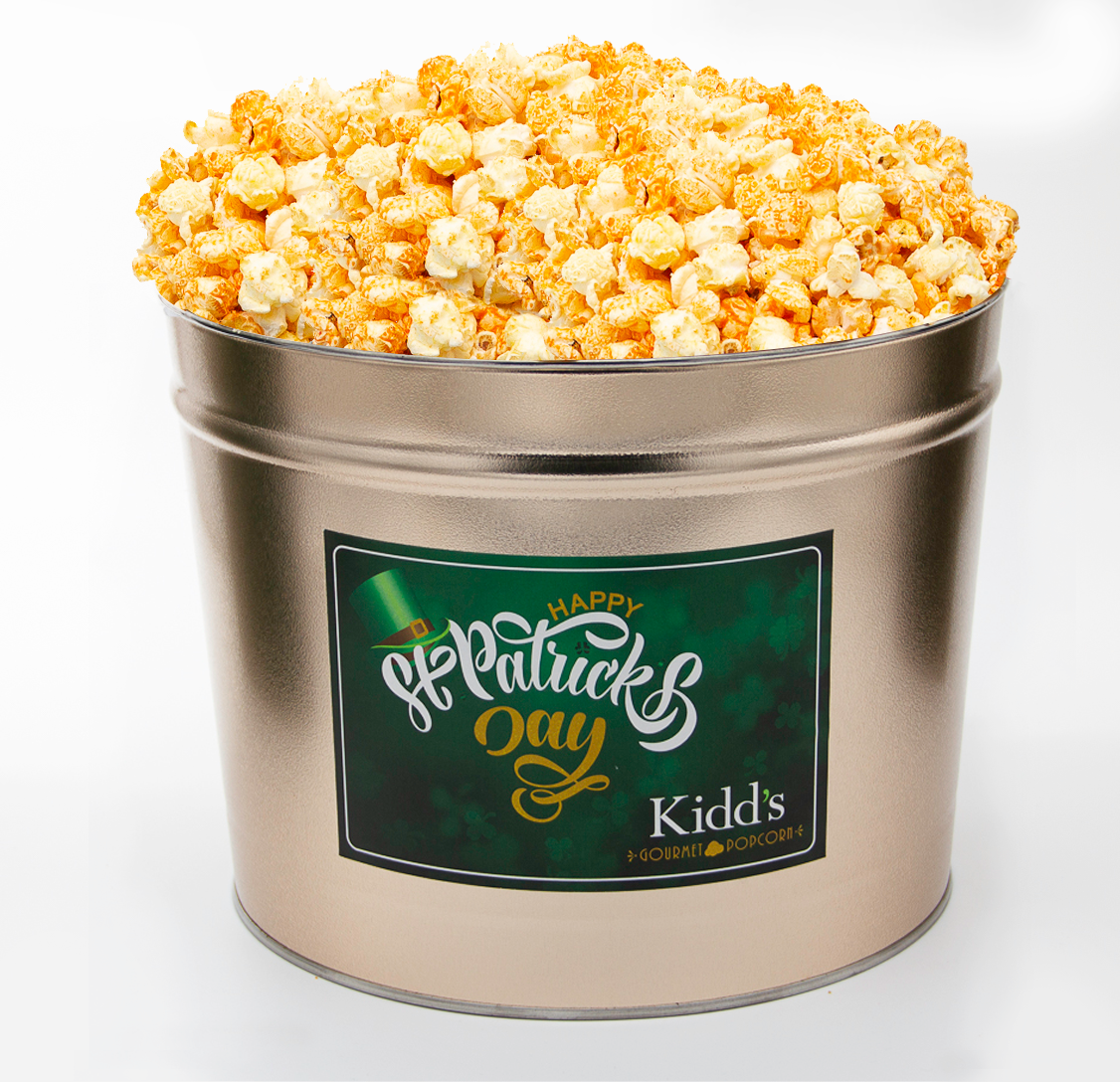 salty cheddar cheese combined with creamy white cheddar gourmet popcorn in gold st. patrick's day popcorn canister