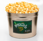 Load image into Gallery viewer, salty cheddar cheese combined with creamy white cheddar gourmet popcorn in gold st. patrick&#39;s day popcorn canister
