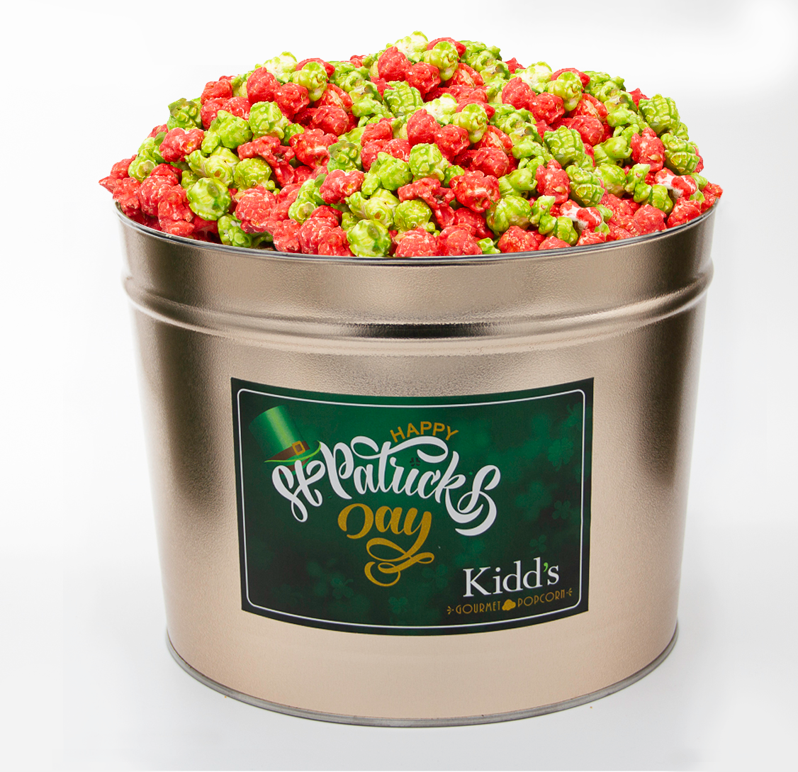 medium st. patrick's day gold tin filled with red hot cinnamon popcorn mixed with tangy green apple.