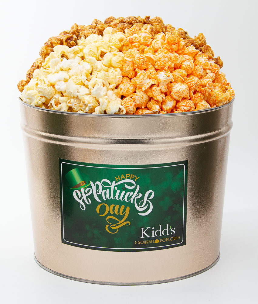 amazing 3 flavor st. patrick's day popcorn tin in caramel, white cheddar, cheese.