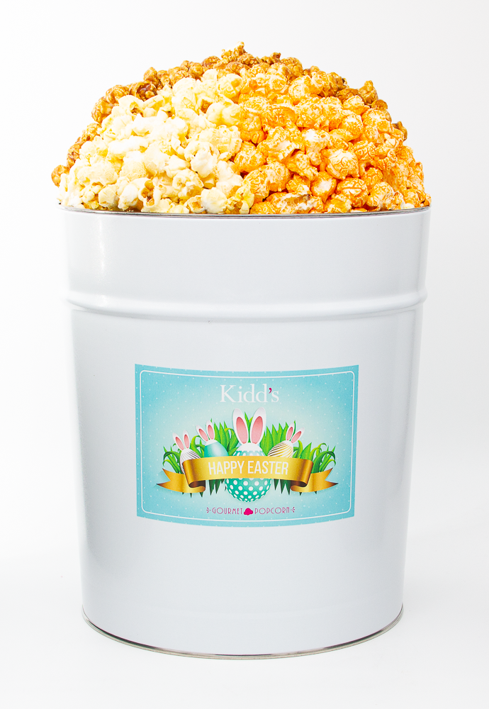 large Easter Basket Gourmet Popcorn Tin filled with the best caramel, cheddar cheese and white cheddar gourmet popcorn in area.