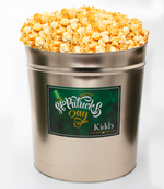 Load image into Gallery viewer, White Cheddar and Cheesey Cheddar Popcorn in shippable St. Patrick&#39;s Day themed gold gift tin.
