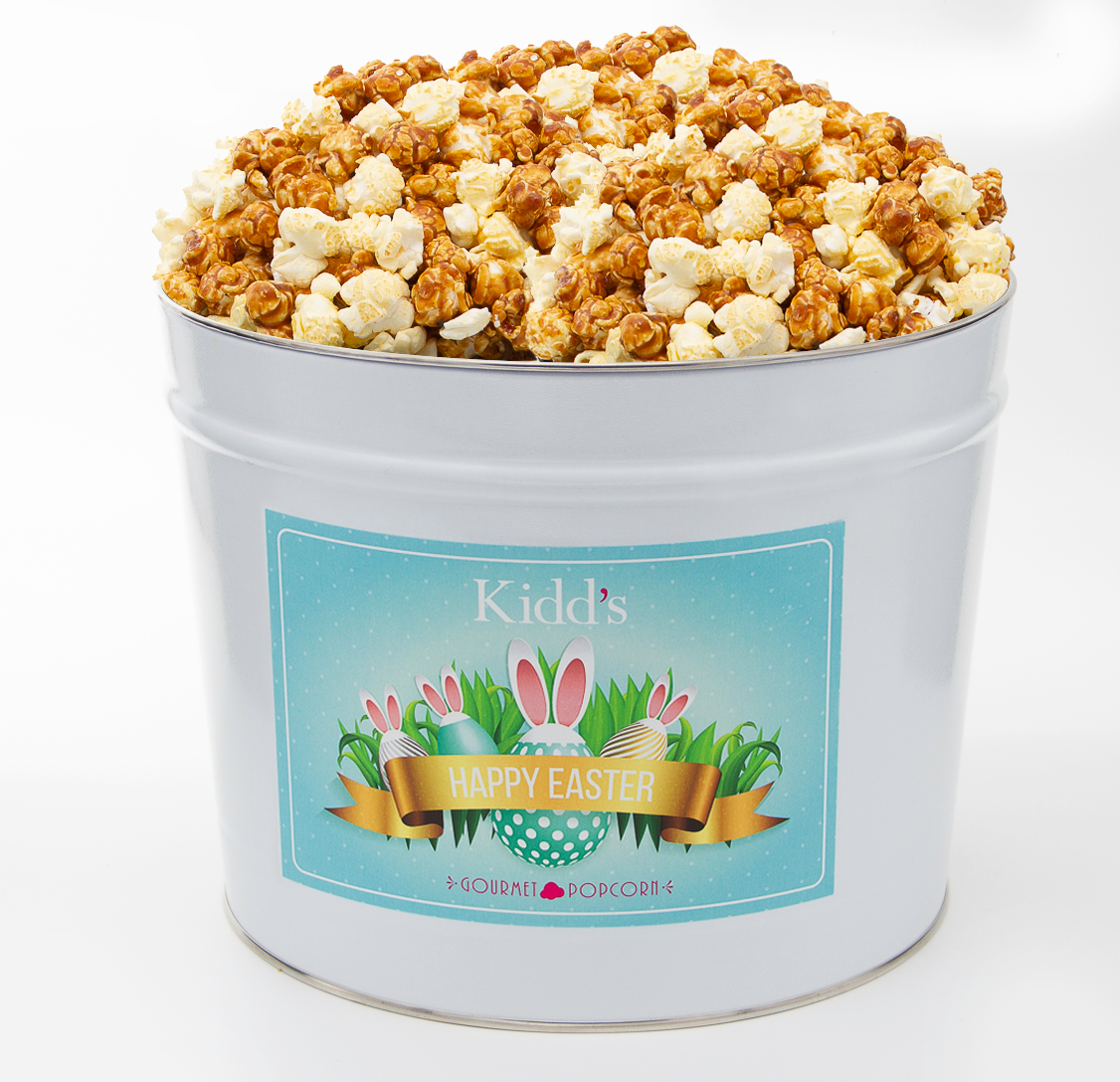 Buy Medium Easter Basket Tin filled with Caramel And White Cheddar Popcorn.