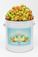 Load image into Gallery viewer, mail the best caramel and green apple flavored popcorn in our Easter Basket Tin.
