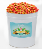 Load image into Gallery viewer, Order Delicious fresh caramel and cinnamon candy popcorn in large Easter Basket Themed Tin and Deliver anywhere in United States.
