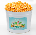 Load image into Gallery viewer, Cheddar Cheese Gourmet Popcorn For Sale in Medium Easter Basket Gift Tin.
