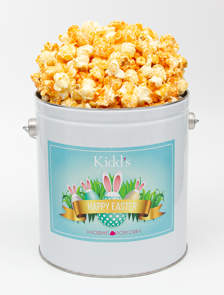 Buy Online and Ship Award Winning Cheddar Cheese and White Cheddar Popcorn in Fancy Easter Basket Tin.