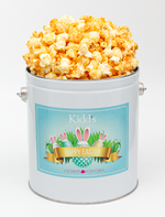 Load image into Gallery viewer, Buy Online and Ship Award Winning Cheddar Cheese and White Cheddar Popcorn in Fancy Easter Basket Tin.
