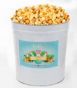 Load image into Gallery viewer, Our Most Popular Gourmet Popcorn Mix of Cheesy Cheddar, Light White cheddar and sweet caramel filled in our Easter Themed Basket. 
