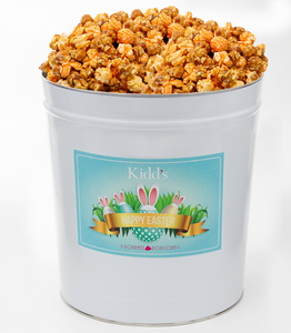 Famous Garrett Mix style popcorn in Caramel and Cheesy Cheddar. Popcorn comes in reusable, shippable Easter Tin.