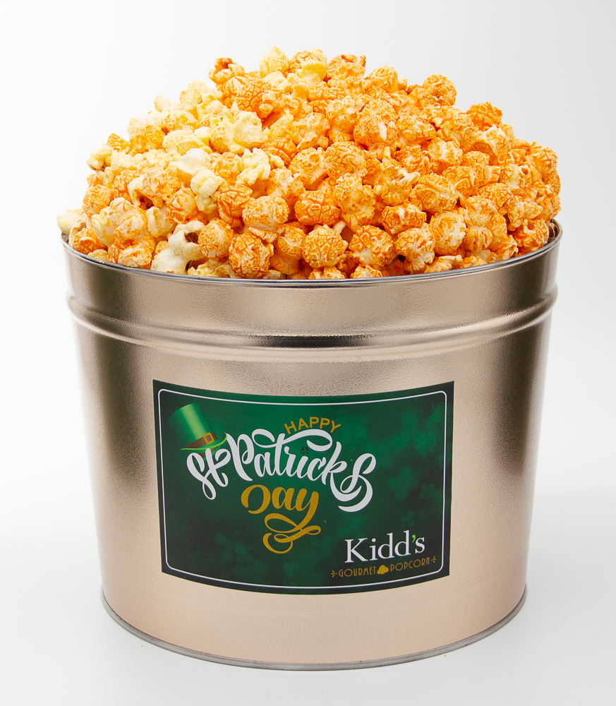 Buy Mouthwatering 3 flavor popcorn tin in Buffalo Ranch, Hot & Spicy and Cheddar and Cheddar Mix. Flavors come in gold 2 gallon St. Patrick's Day themed pop-corn tin.