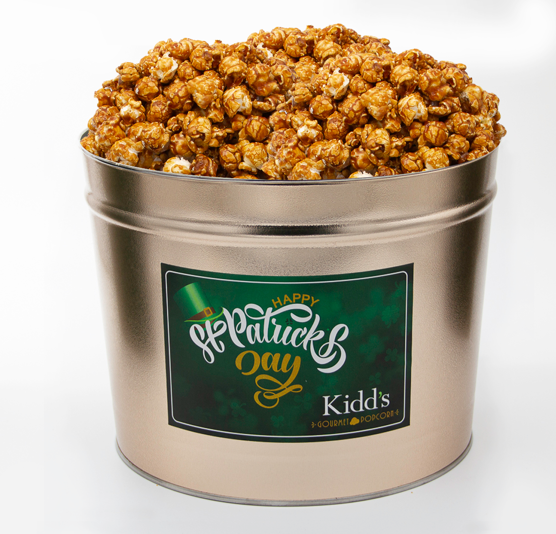 delicious, mouthwatering, award winning caramel corn in deliverable 2 gallon st. patrick's day themed tin.